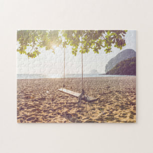 Schwingen auf dem Strand am Sonnenuntergang Puzzle
