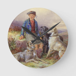 Scottish boy with wolfhounds in a Highland landsca Runde Wanduhr