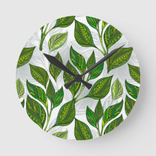 Seamless Pattern with Green Tea Leaves Runde Wanduhr