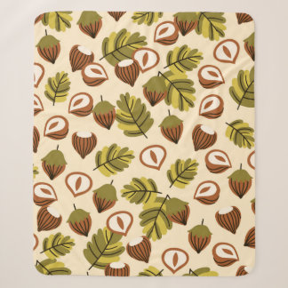 Seamless pattern with hazelnut leaves and acorns. sherpadecke