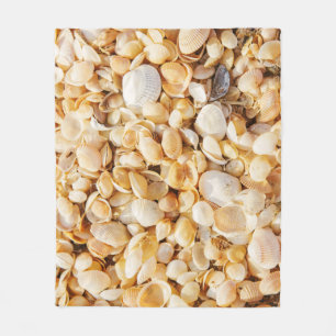 Seashell strukturierte Sommer Strand Hintergrund. Fleecedecke