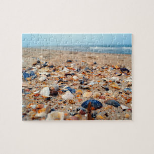 Seashells auf dem Strand-Puzzlespiel Puzzle