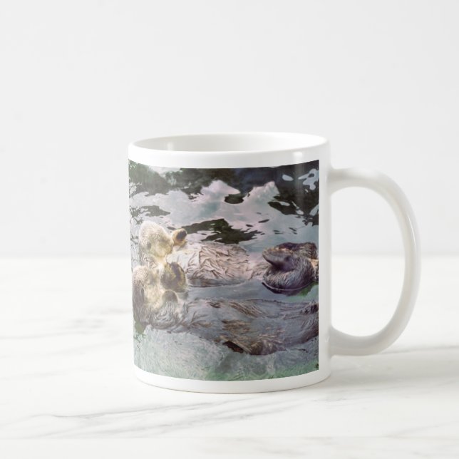 Seeotter, die Hände halten Tasse (Rechts)