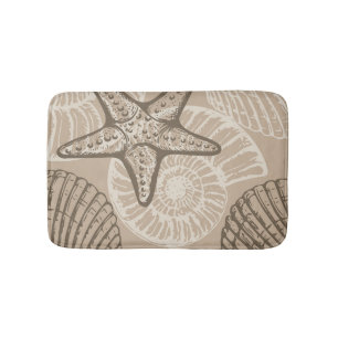 Seesterne und Muscheln in Beige an der Meereswelt Badematte