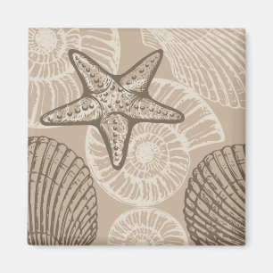 Seesterne und Muscheln in Beige an der Meereswelt Magnet