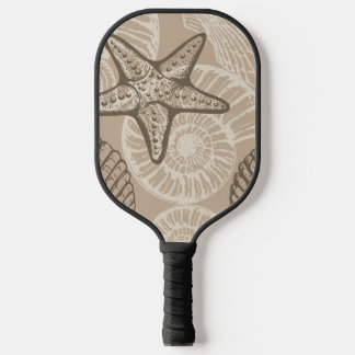 Seesterne und Muscheln in Beige an der Meereswelt Pickleball Schläger