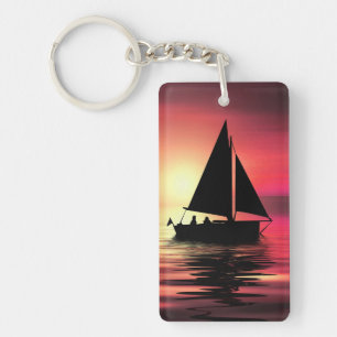 Segelboot bei Sonnenuntergang auf dem Meer Kunstde Schlüsselanhänger