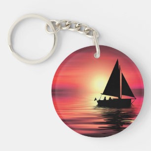 Segelboot bei Sonnenuntergang auf dem Meer Kunstde Schlüsselanhänger