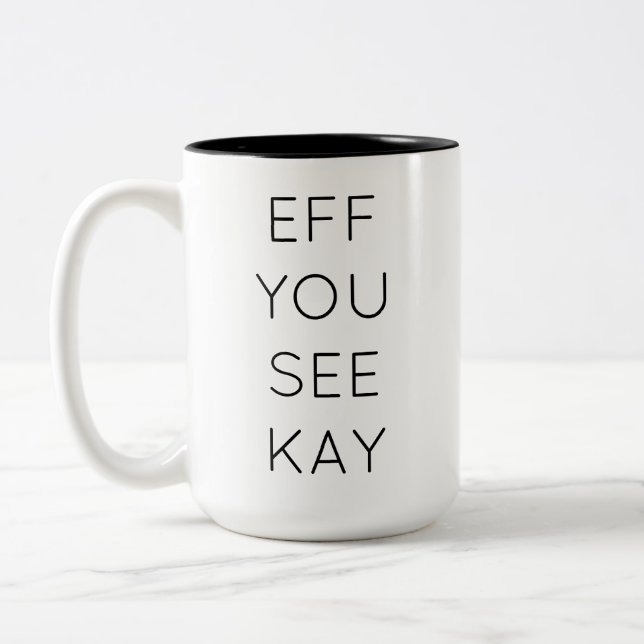SEHEN SIE KAY ZWEIFARBIGE TASSE (Links)