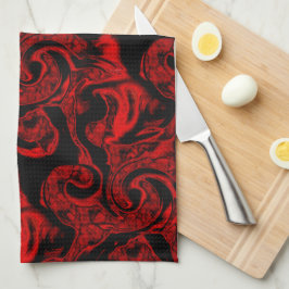 Sehr farbige rote Spiralteile auf schwarzem Hinter Geschirrtuch