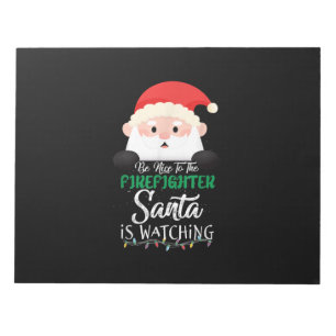 Sei nett zu dem Feuerwehrmann, den Weihnachten sie Notizblock