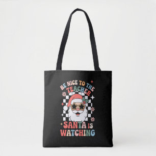 Sei nett zu dem Lehrer, der Weihnachtsmann beobach