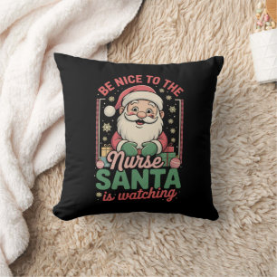Sei nett zu der Schwester, der Weihnachtsmann scha Kissen