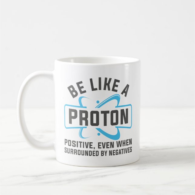 Sei wie ein Proton Kaffeetasse (Links)
