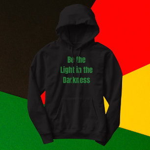 Seien Sie das Licht in der Dunkelheit Inspiration Hoodie