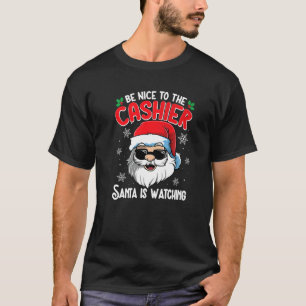 Seien Sie nett zum Kassierer, den der Weihnachtsma T-Shirt