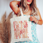 Sein Ich Hallo in der Trauzeugin Sein Ich Personal Tragetasche<br><div class="desc">Die Personalisierte Tote Tasche "It's Me Hi I'm the Trauzeugin" - die perfekte Mischung aus Stil und Funktionalität für Ihre geschätzte Trauzeugin. Diese trendige und niedliche pfirsichkorallenrosa Tasche ist nicht nur ein Accessoire, sondern auch ein Statement-Stück, das die Wichtigkeit Ihrer Trauzeugin widerspiegelt. Diese Tote-Tasche ist mit einem rutschig-runden Text verziert...</div>