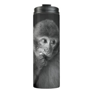 SHALLOW FOCUS FOTOGRAFIE DES SCHWARZEN MONKEY THERMOSBECHER
