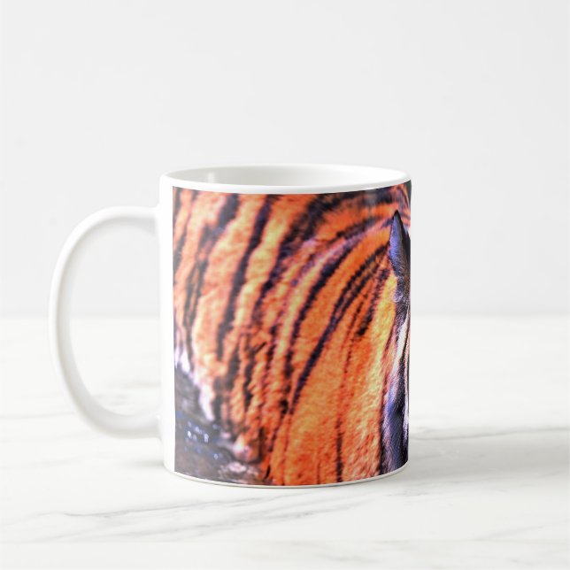 SHALLOW FOCUS FOTOGRAFIE VON BROWN UND SCHWARZ TIG KAFFEETASSE (Links)