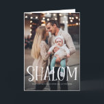 Shalom White Lettering Overlay Happy Hanukkah Feiertagskarte<br><div class="desc">Happy Hanukka! Senden Sie mit dieser Foto-Urlaubskarte mit dem Overlay "Shalom" Urlaubswünsche und Grüße an Familie und Freunde. Personalisieren Sie diese durch Hinzufügen von Namen,  Nachrichten und Fotos. Dieses Design ist als flache Karte,  gefaltete Karte und Postkarte erhältlich.</div>