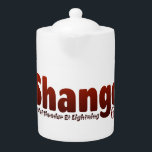 Shango<br><div class="desc">Mit dem Namen "Shango" in dunkelroter Farbe und seinem Titel und seiner Nummer fügt dieses Stück Ihrer Sammlung einen einzigartigen Flair hinzu. Es ist mehr als nur Kleidung, es ist ein Gesprächsstarter, der Ihre Individualität und Wertschätzung für das kulturelle Erbe zeigt.</div>