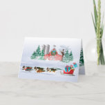 Sheltie Dogs Pulling Red Sleigh Feiertagskarte<br><div class="desc">Die Shelties ziehen den roten Weihnachtsschlitten! Die blauen Merle-,  Tri- und Einweg-Shetland-Schafhunde ziehen mit Geschenken einen Schlitten. Im Hintergrund ist eine rote Scheune mit Schneemann und Schneesturm. Illustriert von der Künstlerin ©Jacqueline Schneider</div>