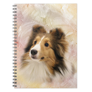 Sheltie stellen gegenüber notizblock