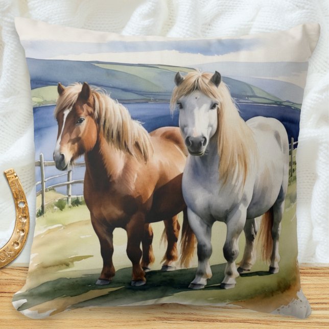 Shetland Ponies Animals Nature Equine Wasserfarbe Kissen (A throw pillow with illustration of two Shetland ponies in a field in a watercolor style)