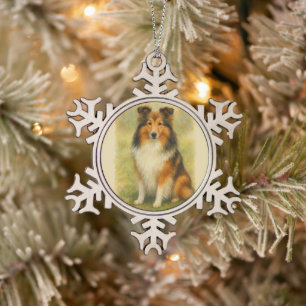 Shetland-Schäferhund sitzt Wasserfarben Schneeflocken Zinn-Ornament