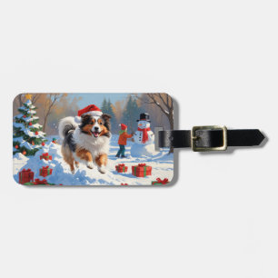 Shetland Sheepdog läuft durch Schnee mit Weihnacht Gepäckanhänger