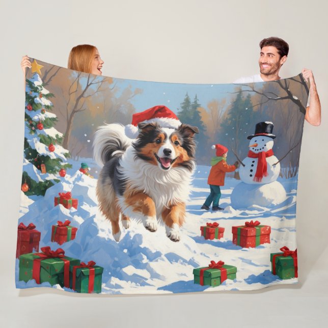 Shetland Sheepdog läuft Schnee mit Weihnachtshut Fleecedecke (Beispiel)