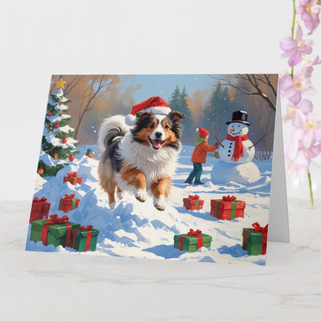 Shetland Sheepdog läuft Schnee mit Weihnachtshut Karte (Orchidee)