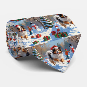 Shetland Sheepdog läuft Schnee mit Weihnachtshut Krawatte