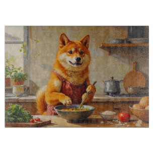 Shiba Inu kocht in der Küche Schneidebrett