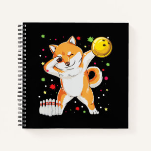 Shiba spielt Bowling Witziger Hund mit Bowling Notizbuch