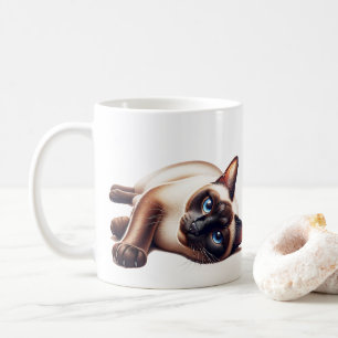 Siamessische Katze, süße Katze mit blauen Augen Kaffeetasse