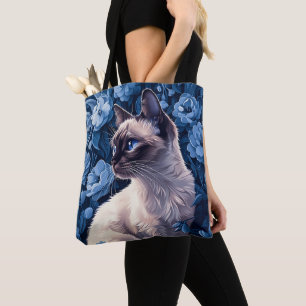 Siamische Katze in Blumen