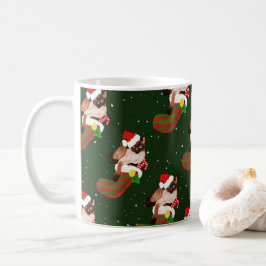 Siamische Katzenjause mit Strumpf und Weihnachtsma Kaffeetasse