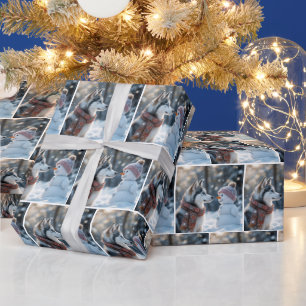 Siberischer Husky beim Snowman Geschenkpapier