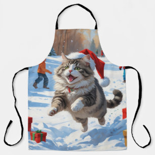 Sibirische Katze läuft im Schnee mit Weihnachtsmüt Schürze