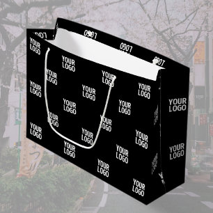 Sich wiederholendes Bild, Design oder Firmenlogo Große Geschenktüte