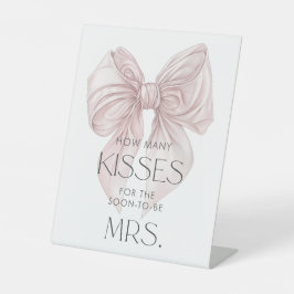 Sie bindet den Knoten Ratet, wie viele Küsse Sockelschild