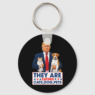 Sie essen die Hunde, die Katzen, die Haustiere. Schlüsselanhänger