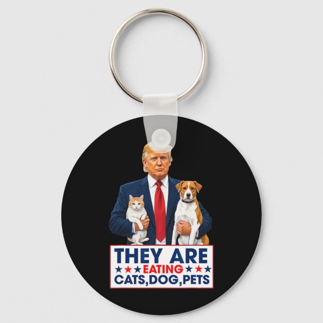 Sie essen die Hunde, die Katzen, die Haustiere. Schlüsselanhänger (Vorderseite)
