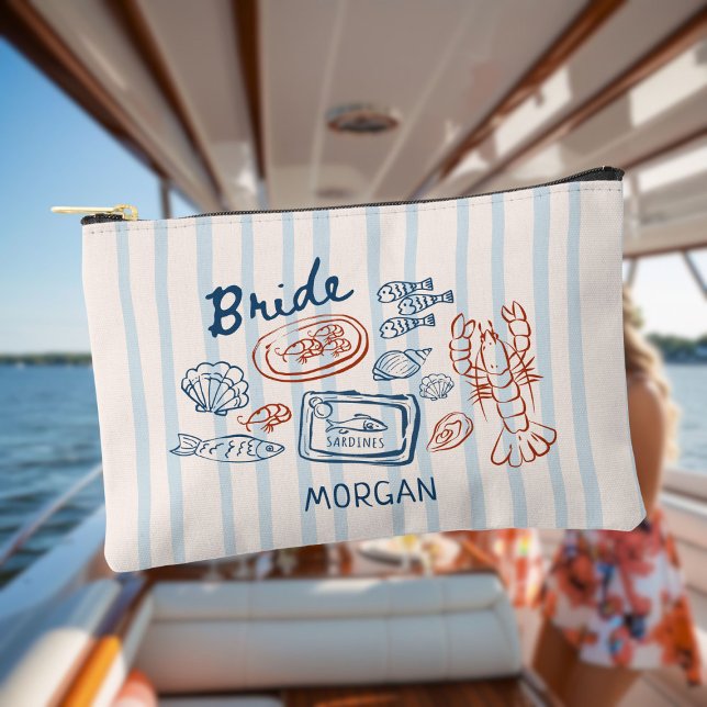 Sie ist eine Fisch-Meeresfrüchte-Bachelorette Zubehörtasche (Von Creator hochgeladen)
