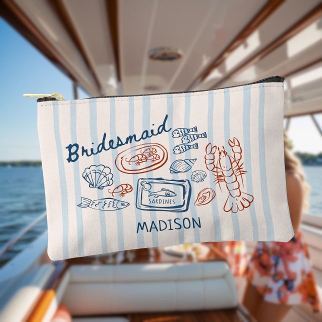 Sie ist eine Fisch-Meeresfrüchte-Bachelorette Zubehörtasche (Von Creator hochgeladen)