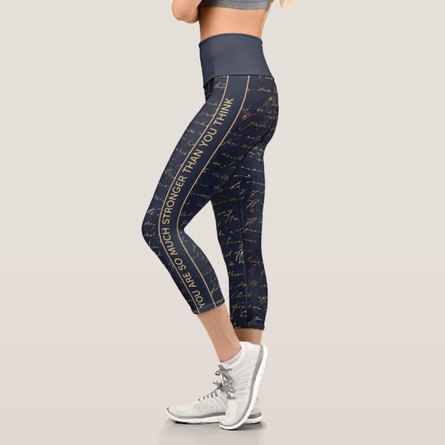 Sie sind stärkere inspirierende blaue Goldschrifte Capri Leggings (Links)
