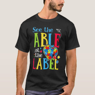 Sieh das Können, nicht das Label Autismus-Puzzle- T-Shirt