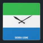 Sierra Leone Flag Dazzling Patriotic Quadratische Wanduhr<br><div class="desc">Sierra Leone Flag Dazzling Patriotic Square Wall Uhr in den Farben und die Elemente der Sierra Leone Nationalflagge, die die Front der Uhr bedeckt. Nationale Flaggenfarben werden durch den Text "Sierra Leone" am unteren Rand ergänzt. Der Text kann mit der Funktion "Anpassen!" vollständig angepasst werden. Fühlen Sie sich frei, es...</div>