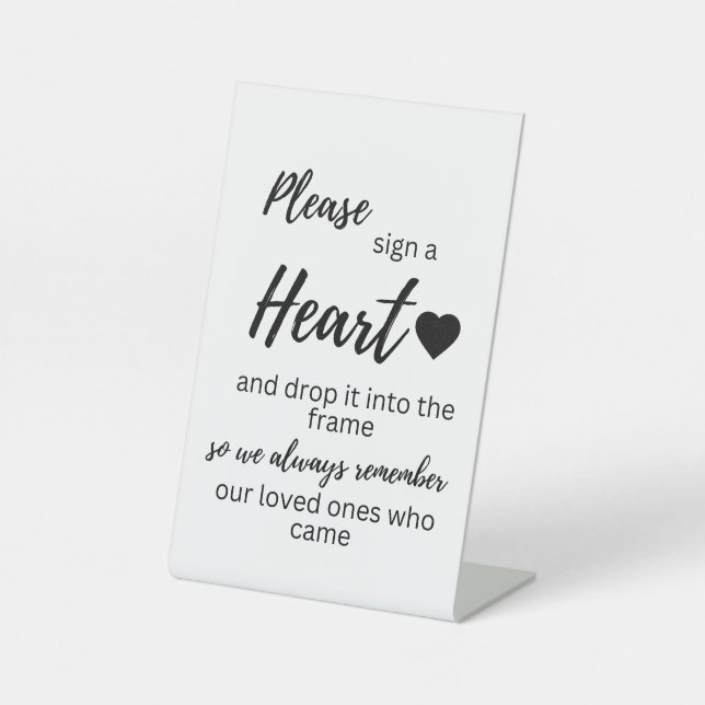 Signieren eines Herzsignatars Sockelschild (Vorderseite)